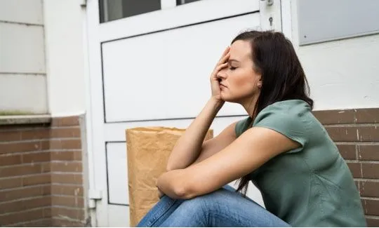 woman can't unlock door