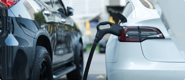 Electric vehicle plugged into a charging port