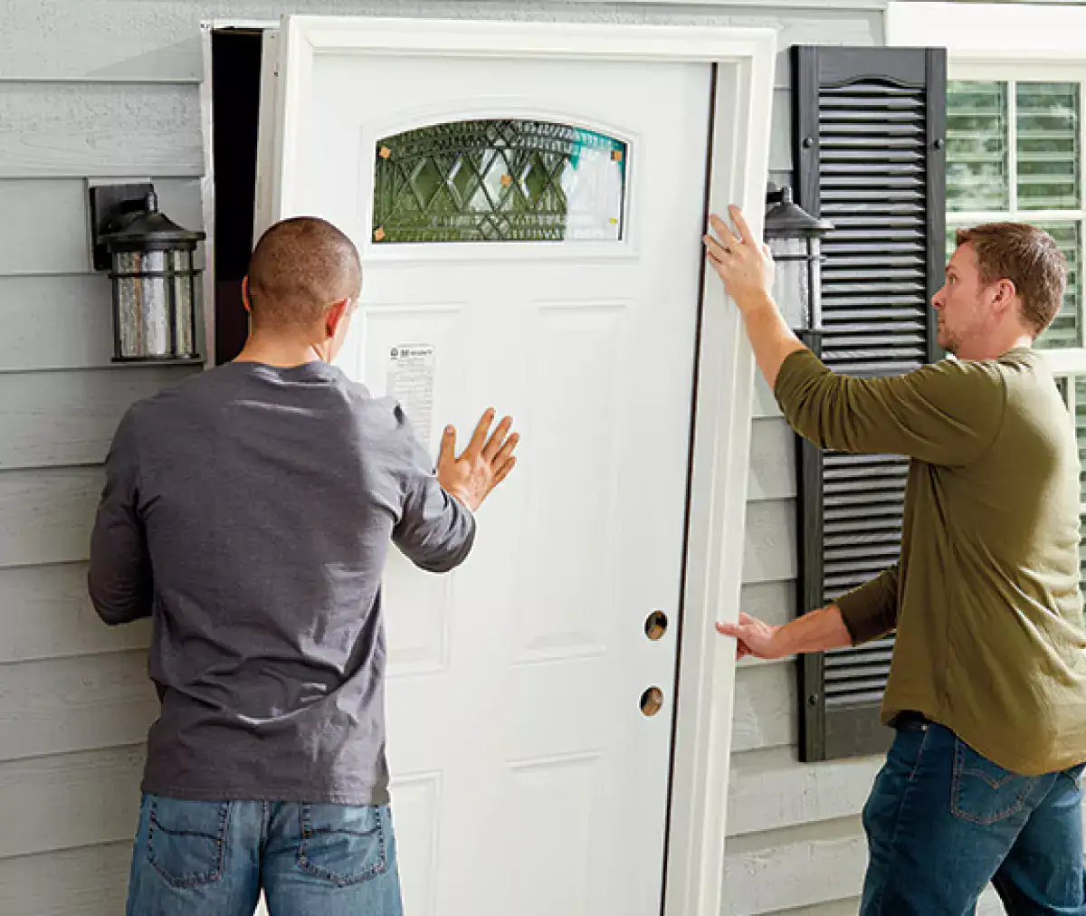 Front door installation service in progress