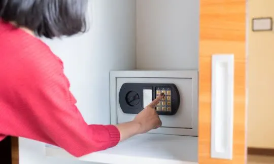 woman opens a safe