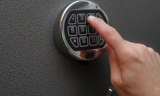 entering passcode to gun safe