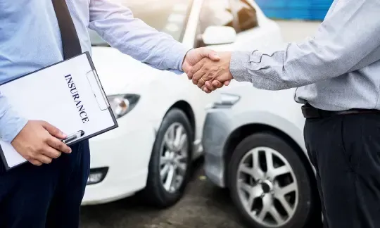 Insurance agent with customer