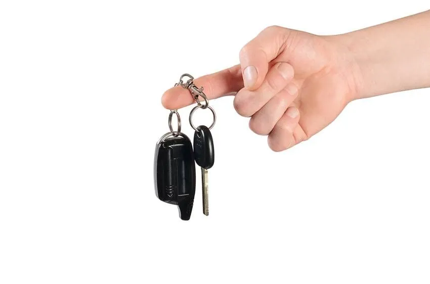 keys from the car in man's hand