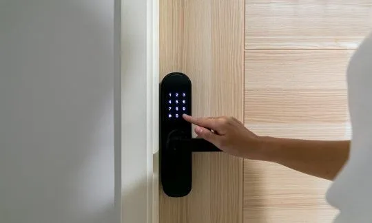 woman uses keypad lock