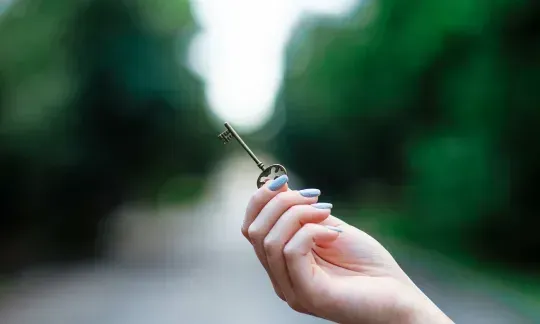 skeleton key in a hand