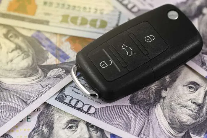 car key on dollars
