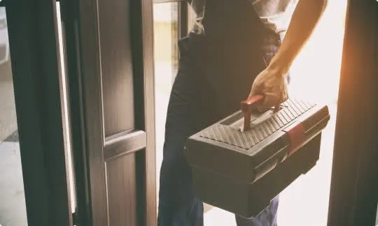 locksmith with a toolbox