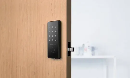 smart door lock on a wooden door