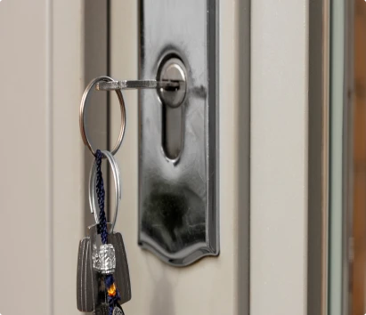 Close-up of a key in a front door lock